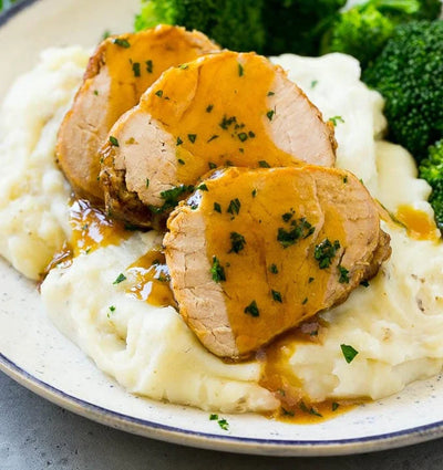 Immagine ricetta Filetti di maiale glassato al mandarino con purè all'olio aromatico